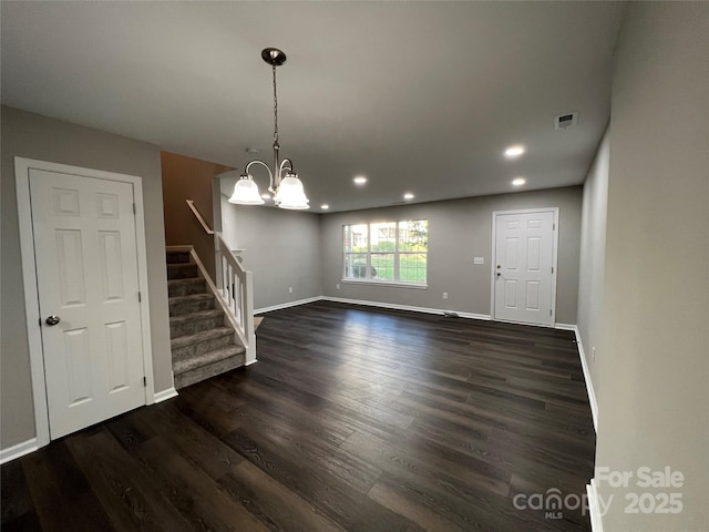 9103 Exbury Ct, Charlotte, NC 28269 - interior space featuring dark hardwood / wood-style floors and a notable chandelier