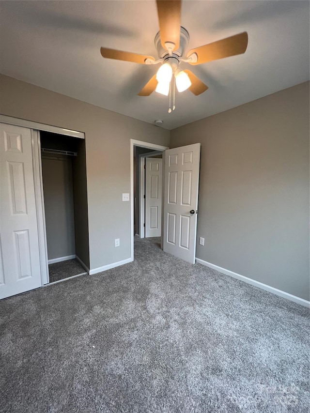 9103 Exbury Ct, Charlotte, NC 28269 - unfurnished bedroom with ceiling fan, a closet, and dark colored carpet