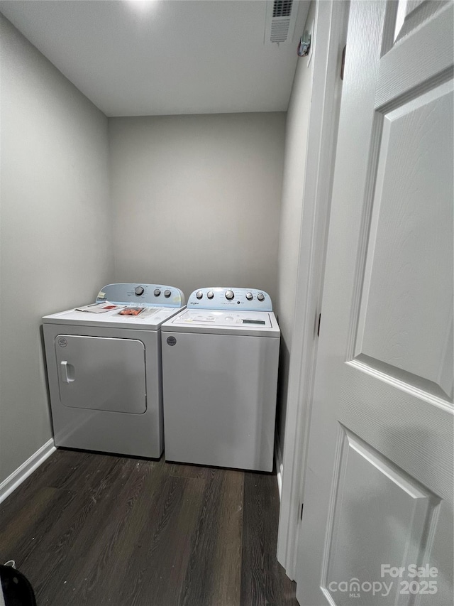 9103 Exbury Ct, Charlotte, NC 28269 - laundry room with dark wood-type flooring and washer and clothes dryer