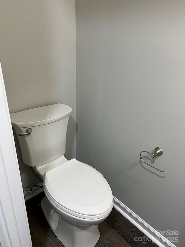 9103 Exbury Ct, Charlotte, NC 28269 - bathroom featuring hardwood / wood-style flooring and toilet