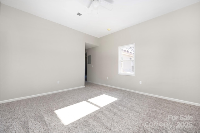 unfurnished room featuring ceiling fan, carpet, and baseboards