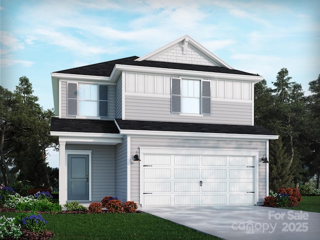 view of front of house with a garage and a front yard