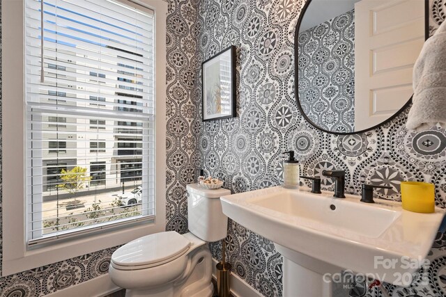 bathroom with sink and toilet