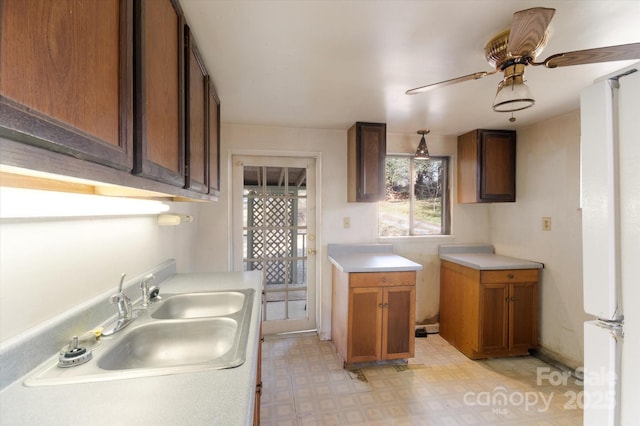 kitchen with sink and ceiling fan