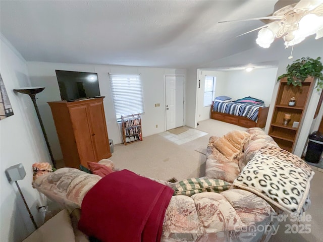 carpeted bedroom featuring ceiling fan