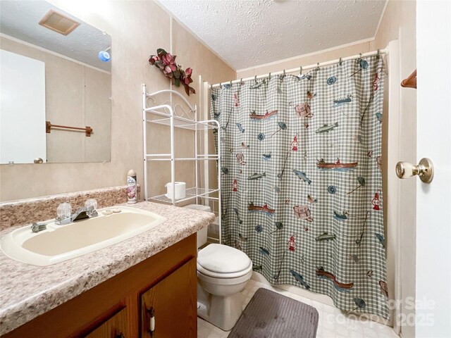 bathroom featuring walk in shower, toilet, a textured ceiling, vanity, and tile patterned flooring