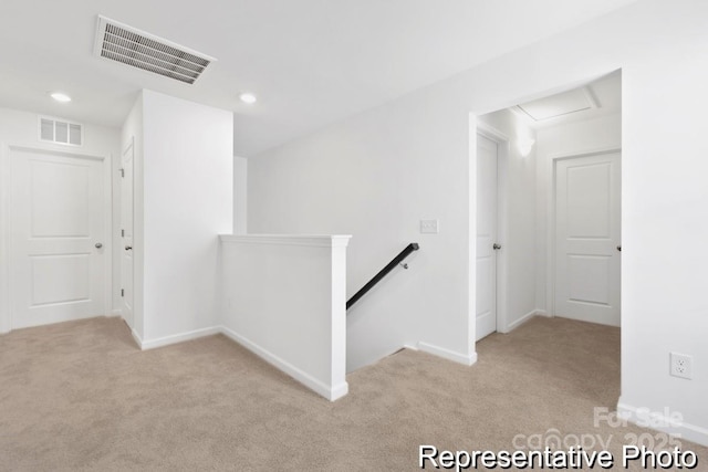 110 Shay Crossing Rd Unit 1P, Salisbury, NC 28144 - hall with an upstairs landing, light carpet, recessed lighting, and attic access