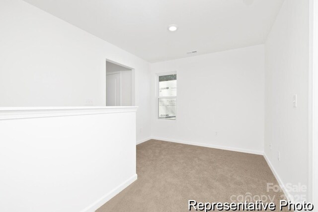 110 Shay Crossing Rd Unit 1P, Salisbury, NC 28144 - carpeted spare room featuring baseboards and recessed lighting