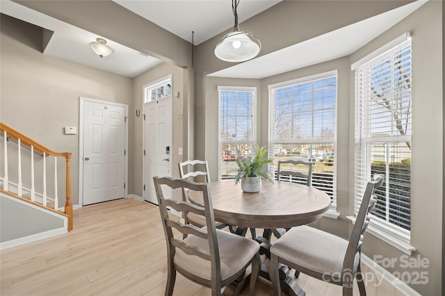 dining room with light wood-type flooring