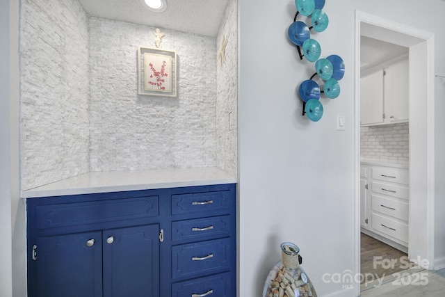 bathroom with tasteful backsplash