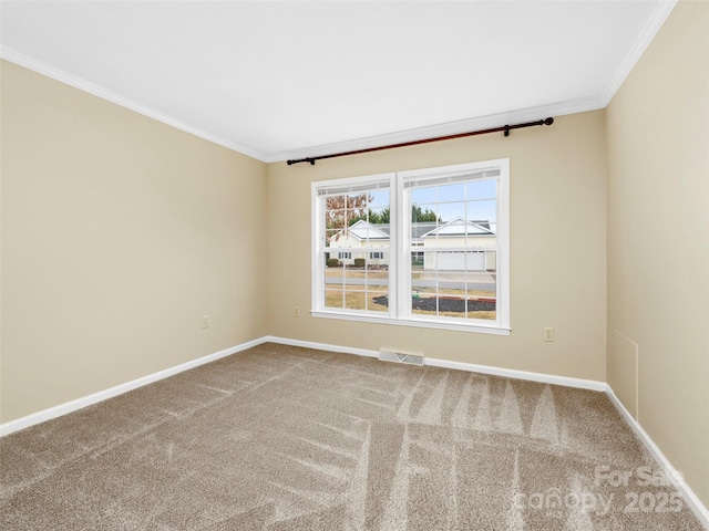 449 Riverwind Dr, Hendersonville, NC 28739 - carpeted spare room with baseboards, visible vents, and ornamental molding