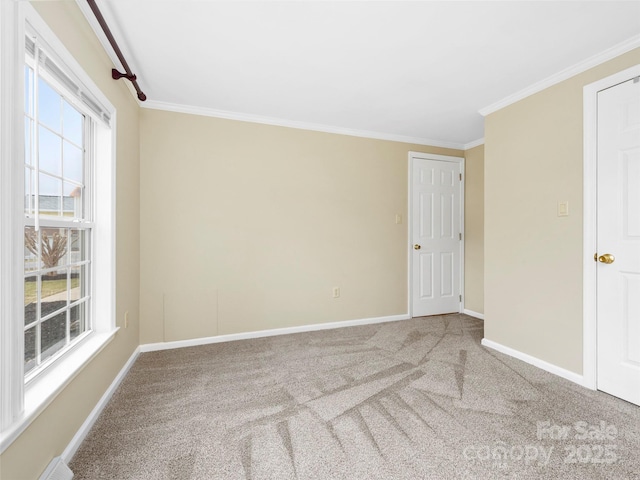 449 Riverwind Dr, Hendersonville, NC 28739 - carpeted spare room featuring baseboards, visible vents, and crown molding