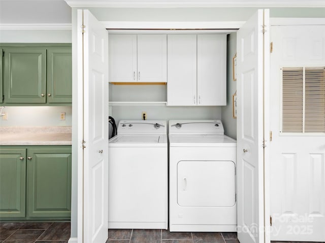 449 Riverwind Dr, Hendersonville, NC 28739 - washroom with cabinet space, ornamental molding, visible vents, and washer and dryer