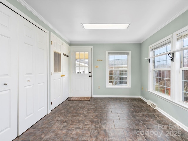 449 Riverwind Dr, Hendersonville, NC 28739 - entrance foyer with stone finish floor, crown molding, baseboards, and visible vents