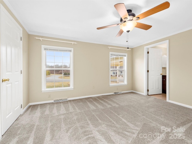 449 Riverwind Dr, Hendersonville, NC 28739 - unfurnished bedroom featuring baseboards, visible vents, crown molding, and carpet floors