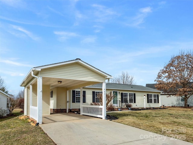 449 Riverwind Dr, Hendersonville, NC 28739 - view of front of home with an attached carport, a front yard, and concrete driveway