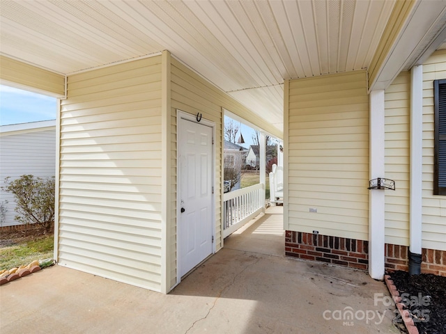 449 Riverwind Dr, Hendersonville, NC 28739 - doorway to property featuring a porch