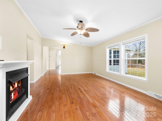 449 Riverwind Dr, Hendersonville, NC 28739 - unfurnished living room with baseboards, light wood-style flooring, and ornamental molding