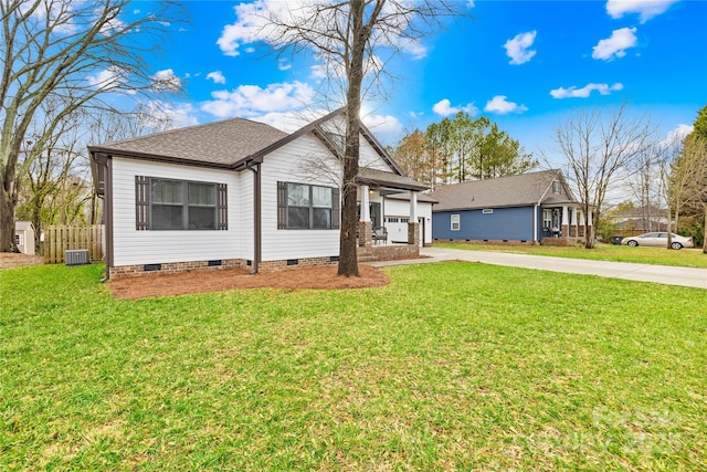 view of front of house with central AC unit, covered porch, and a front lawn