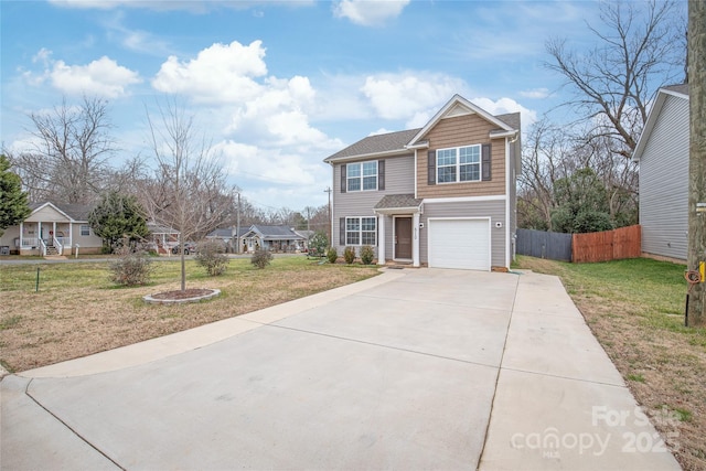 traditional-style house with driveway, a front lawn, a garage, and fence