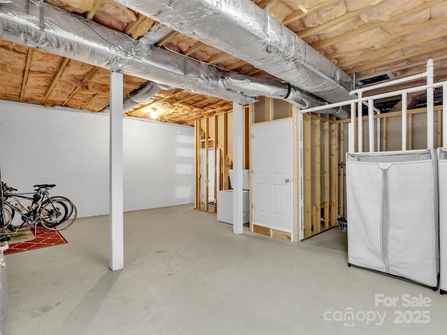 basement featuring fridge