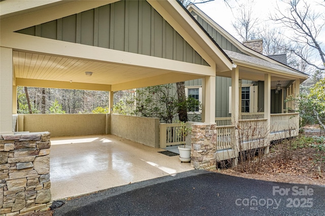 exterior space with an attached carport