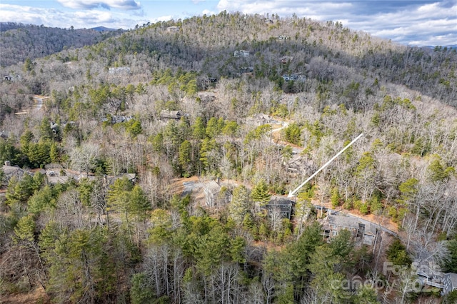 aerial view featuring a forest view