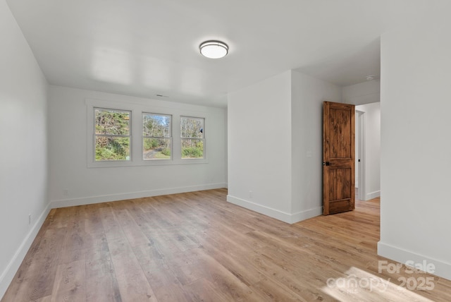 empty room featuring light hardwood / wood-style floors