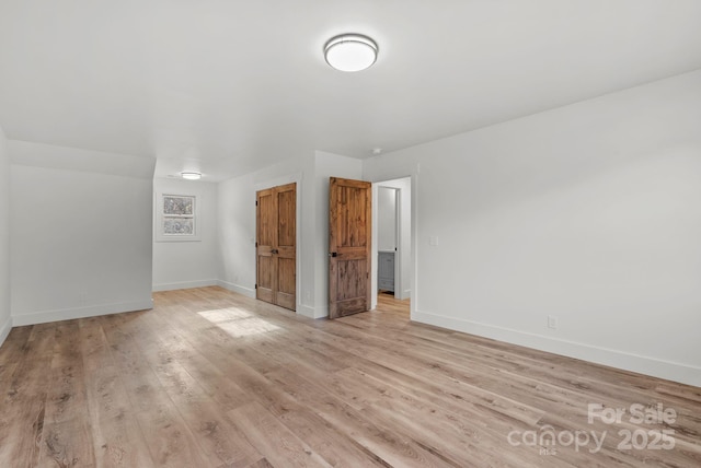 unfurnished bedroom featuring light hardwood / wood-style flooring