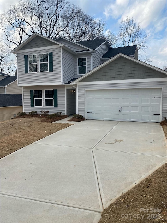 front of property featuring a garage