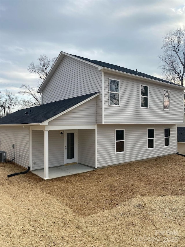 back of house featuring a patio area