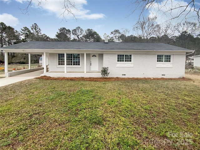 ranch-style house with a carport, covered porch, and a front lawn