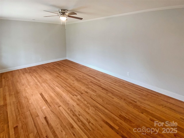 unfurnished room with crown molding, ceiling fan, and light wood-type flooring