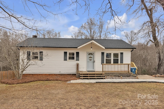 view of front of property featuring a wooden deck