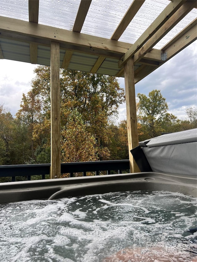 exterior details featuring a hot tub