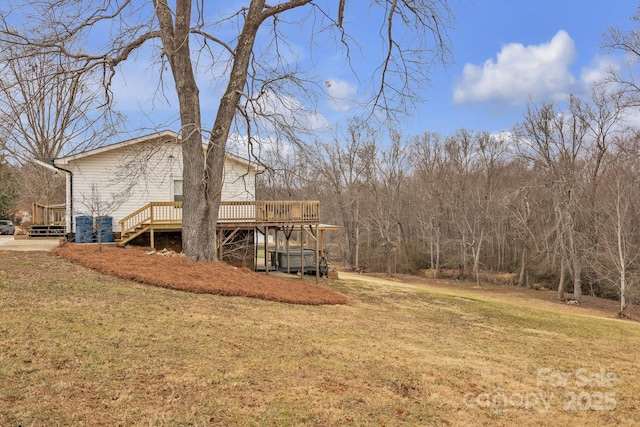 view of yard with a deck