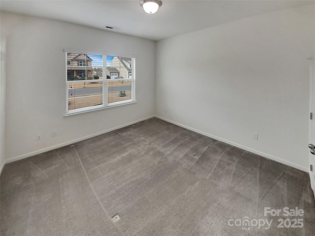 view of carpeted spare room