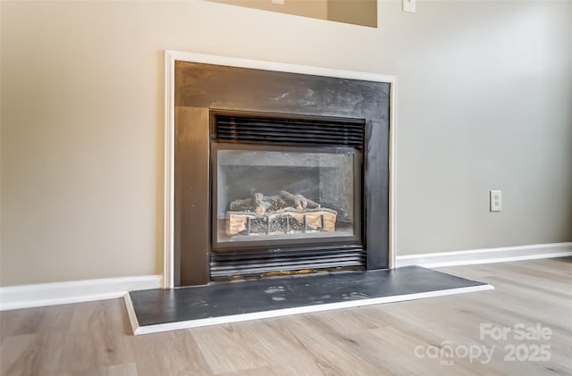 interior details with hardwood / wood-style floors