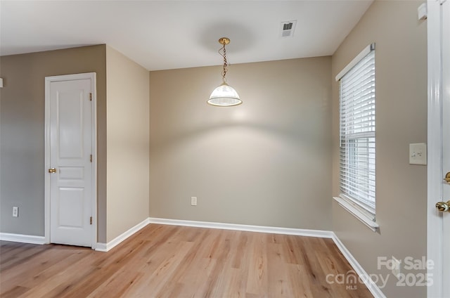 empty room featuring hardwood / wood-style floors