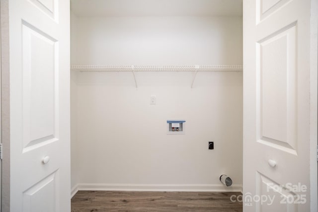 clothes washing area featuring hookup for a washing machine, electric dryer hookup, and dark wood-type flooring