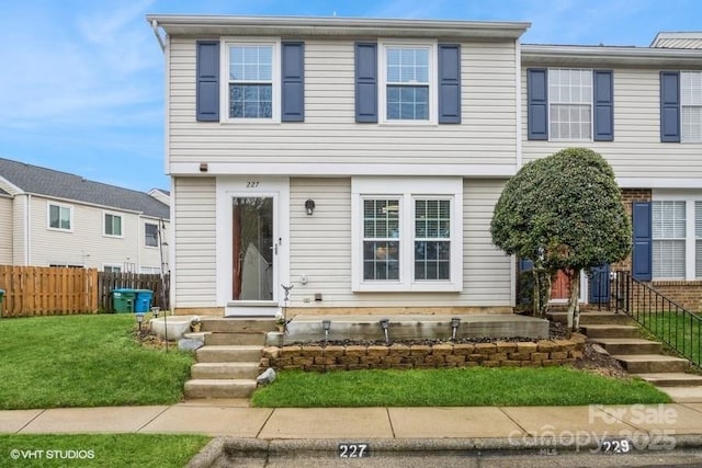 view of front facade with a front yard