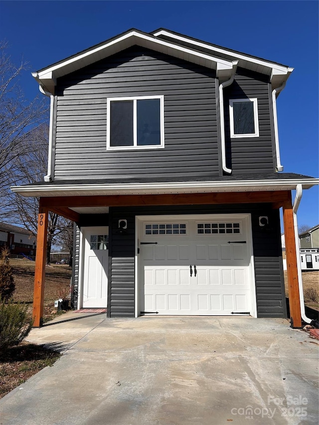 view of front of property featuring a garage