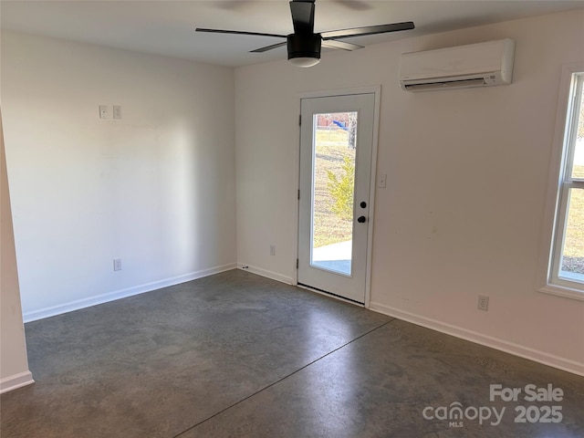 interior space featuring a wall mounted air conditioner and ceiling fan