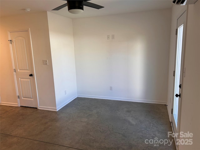 empty room featuring ceiling fan