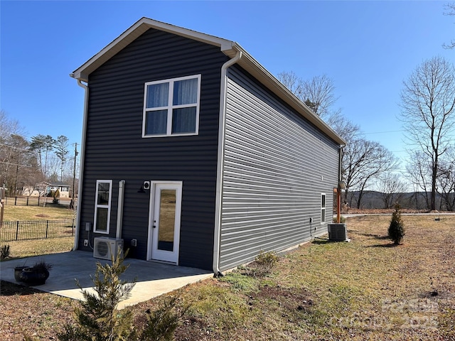 back of house with a patio