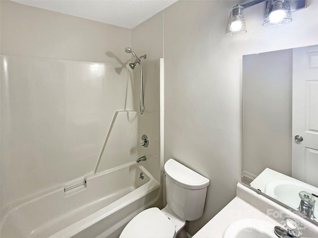 full bathroom with shower / tub combination, vanity, and toilet