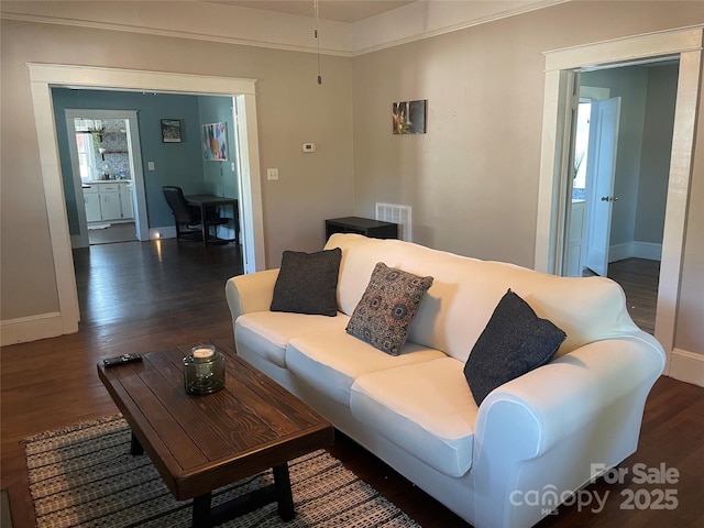 living room with dark hardwood / wood-style floors