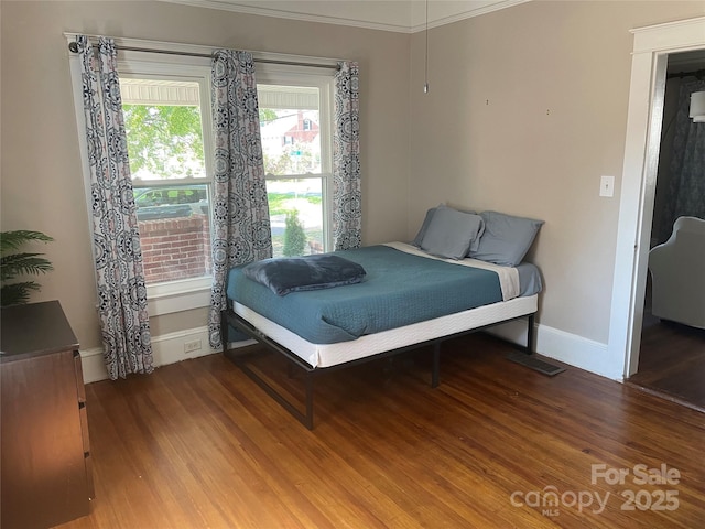 bedroom featuring hardwood / wood-style flooring