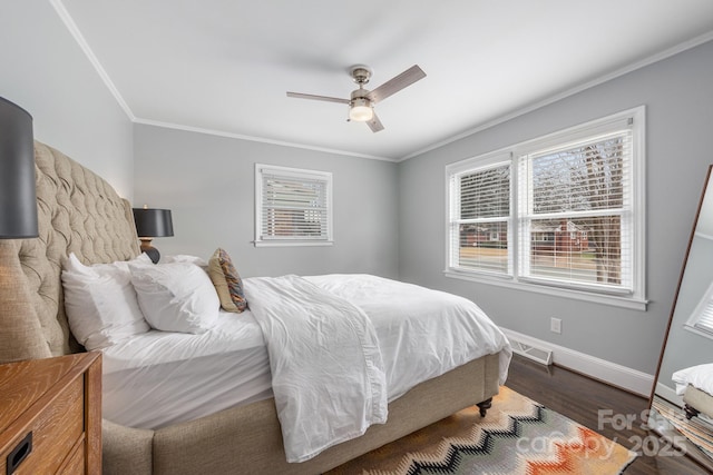 bedroom with wood-type flooring, ceiling fan, and crown molding