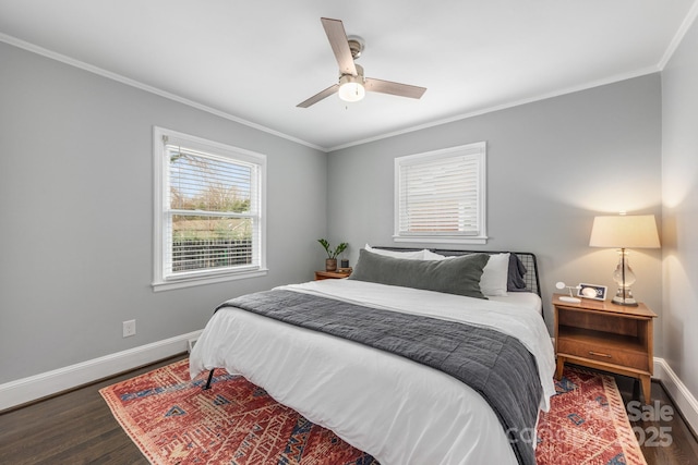 bedroom with ceiling fan, ornamental molding, and dark hardwood / wood-style flooring